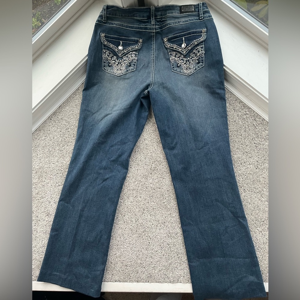 Earl Jeans with embroided rhinestone pocket detailing